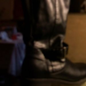 Thigh high black leather boots